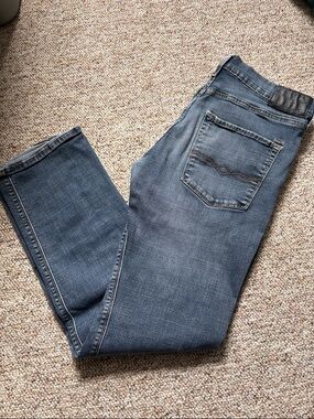 Denizen from Levi's Men's Slim Straight Jeans in Faded Blue